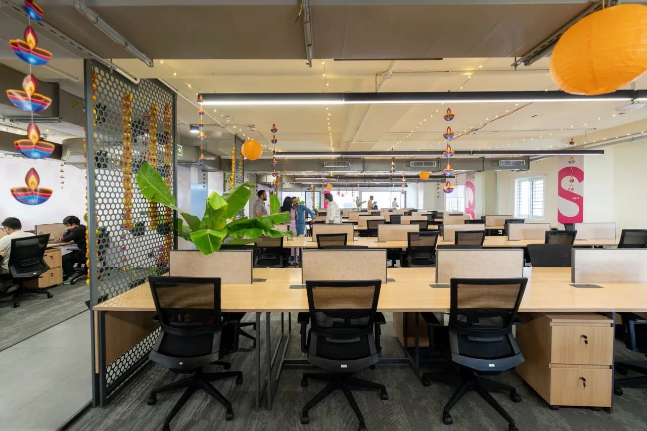 Workstations at Snabbit's ClayWorks 5B headquarters with Snabbit brand graphics